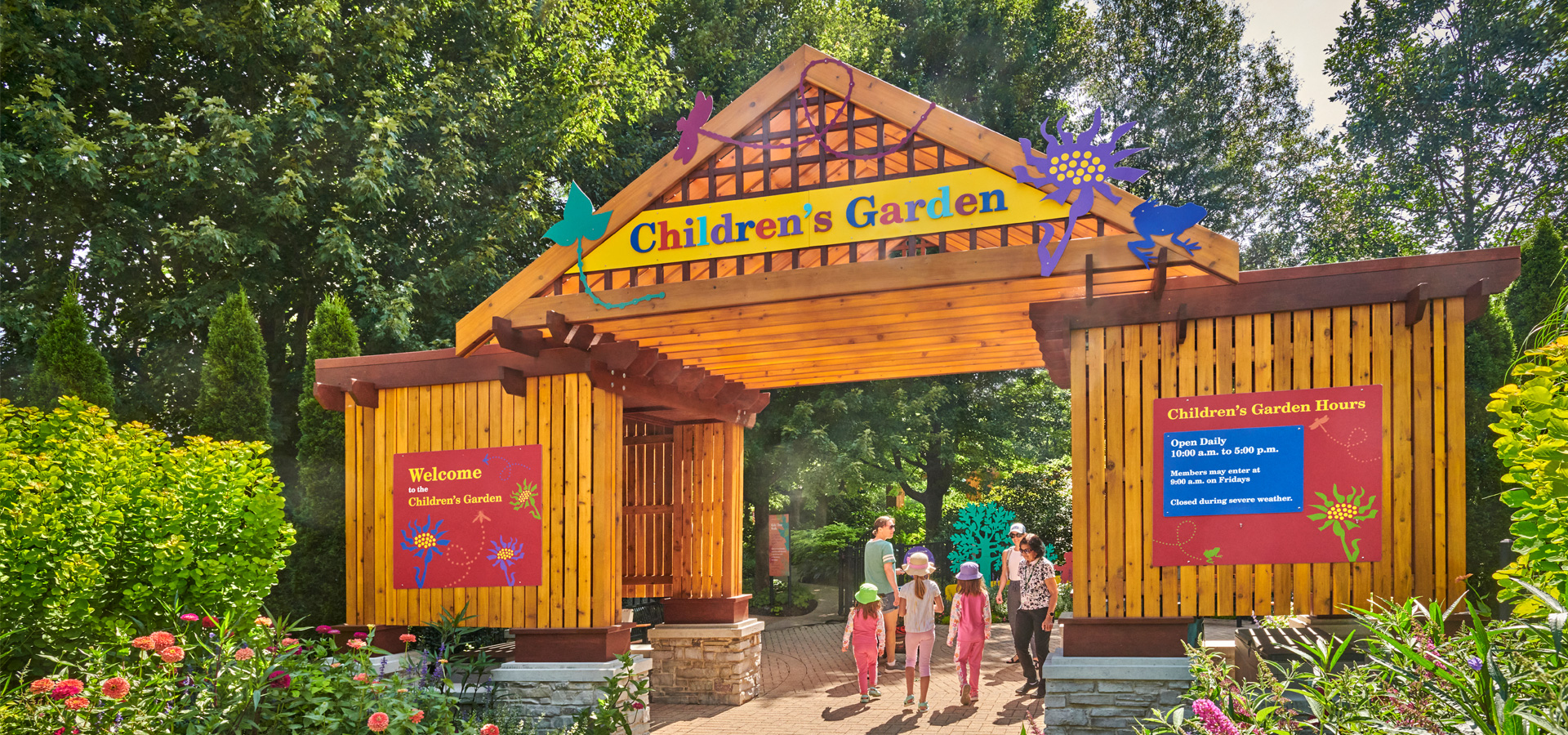 A new Children's Garden entrance with guests walking in