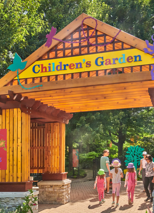 A new Children's Garden entrance with guests walking in