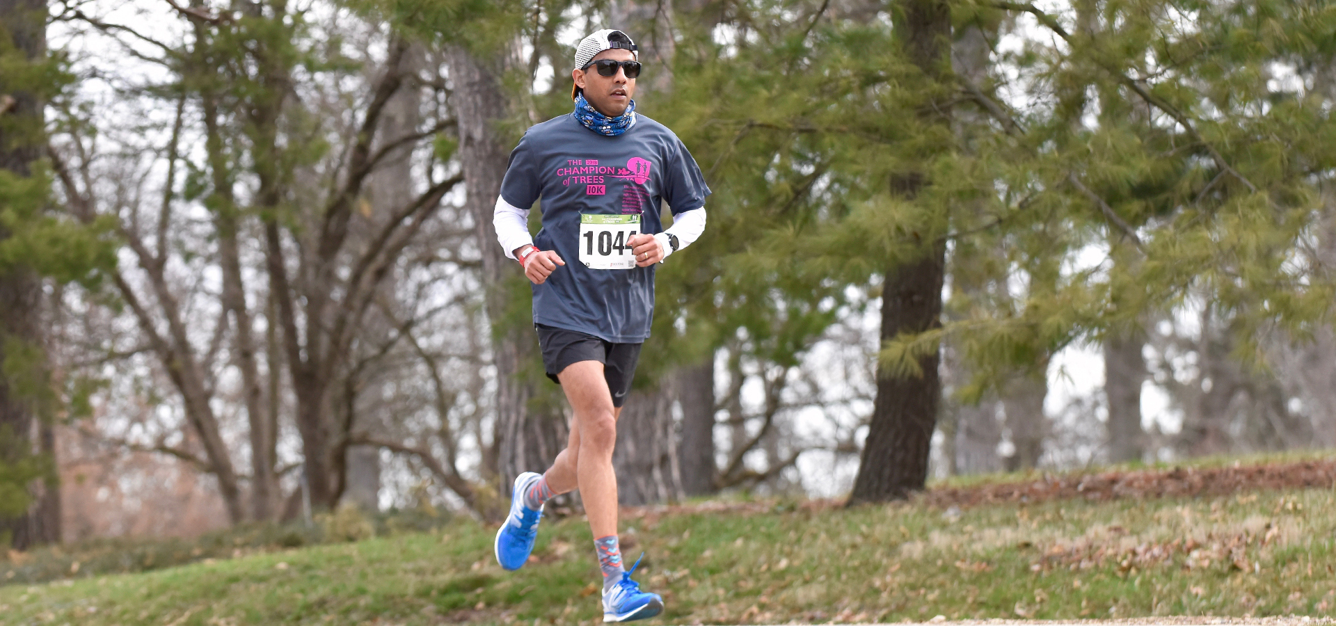 Runner runs the champion of trees 10K in spring