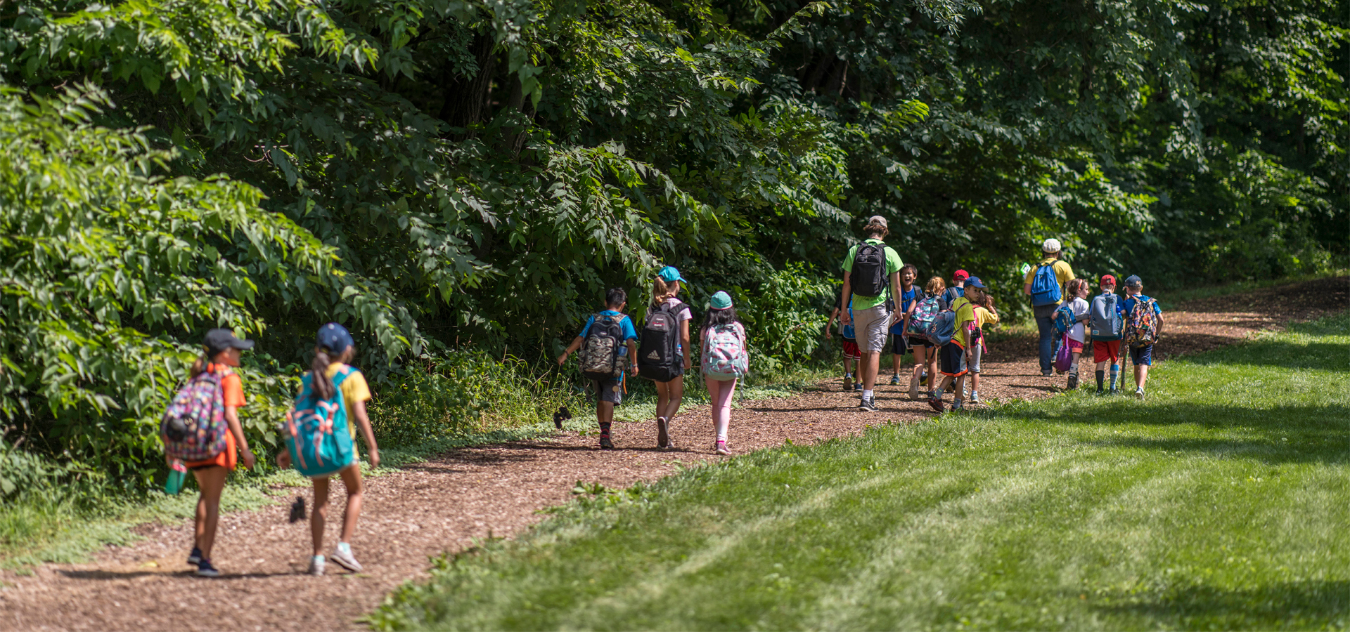 Kids hiking on chipped trail