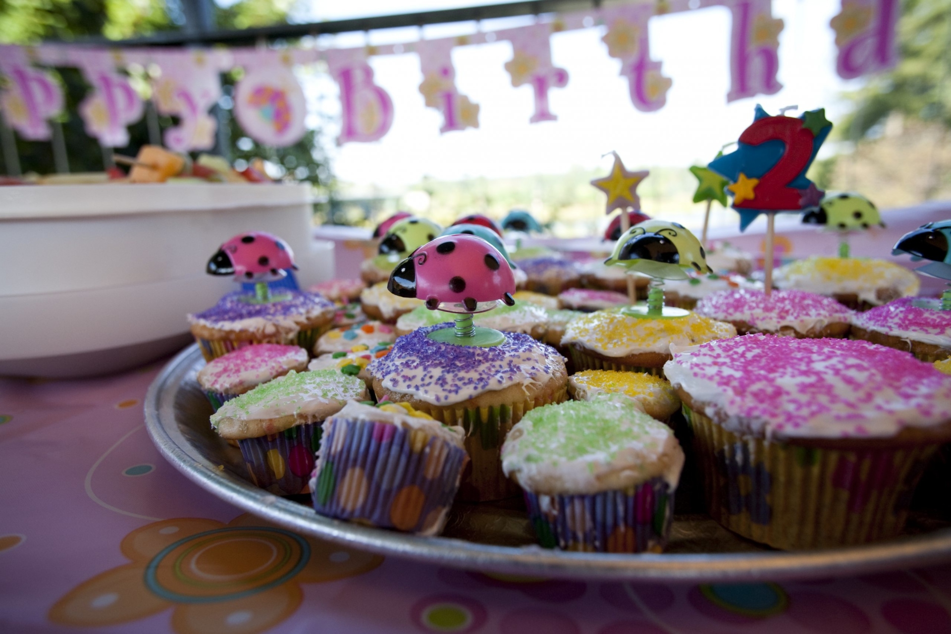 Closeup of birthday cupcakes at a birthday party