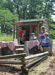 Kids play in the mud kitchen