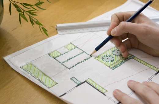 Planning a garden out on paper.