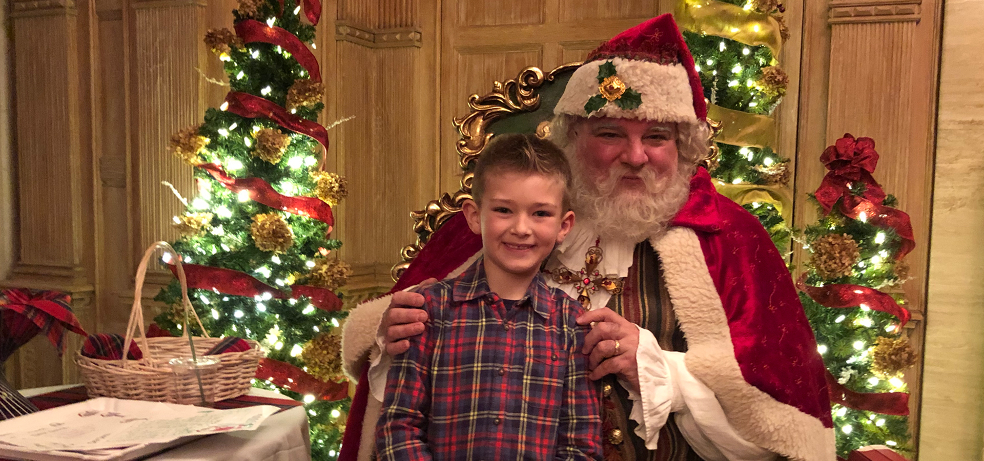 A child poses with St Nick