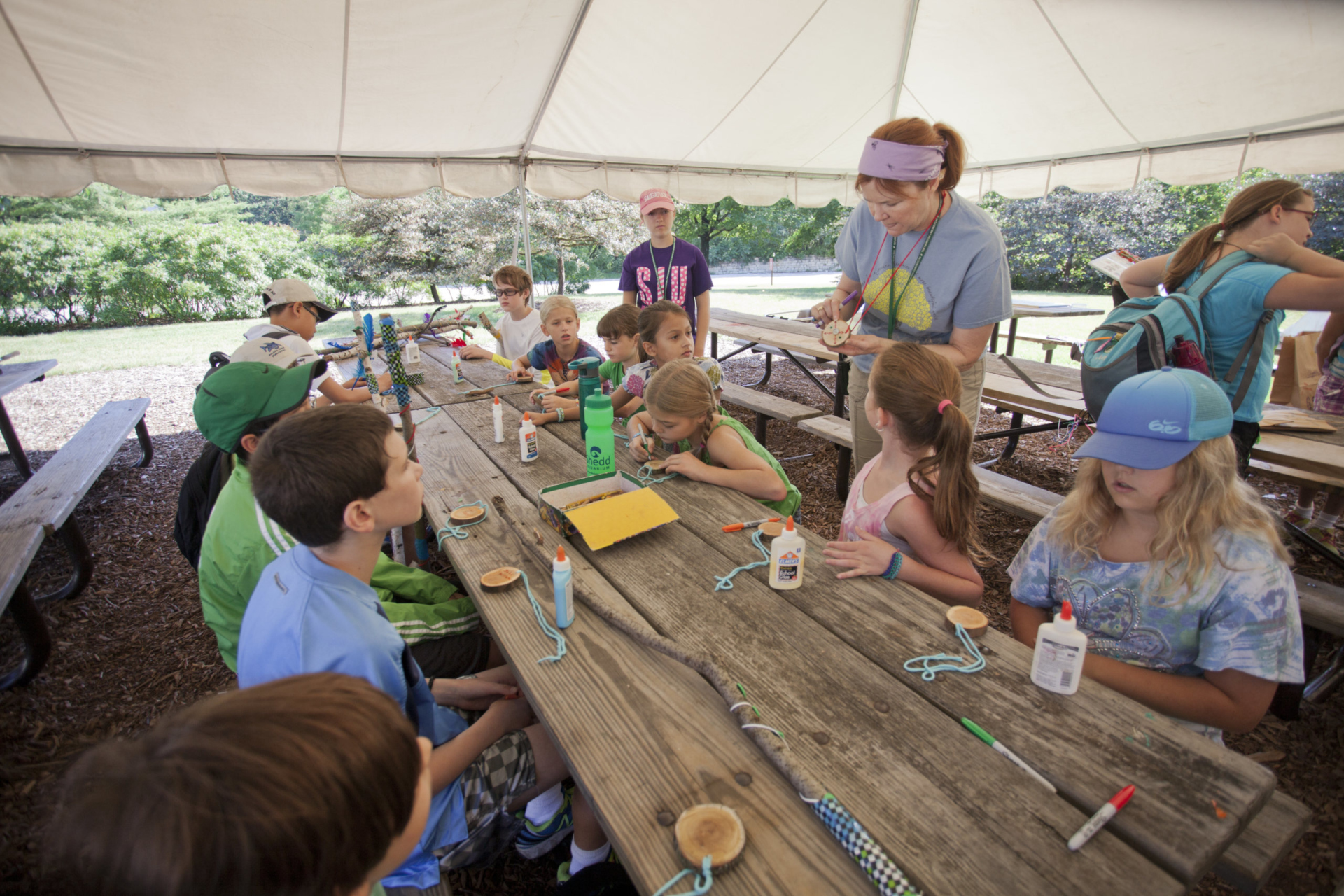 Summer science camp group make crafts