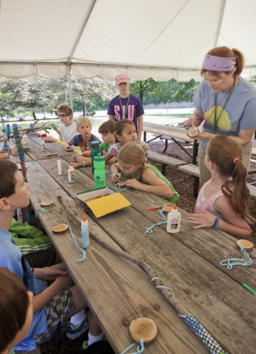 Summer science camp group make crafts