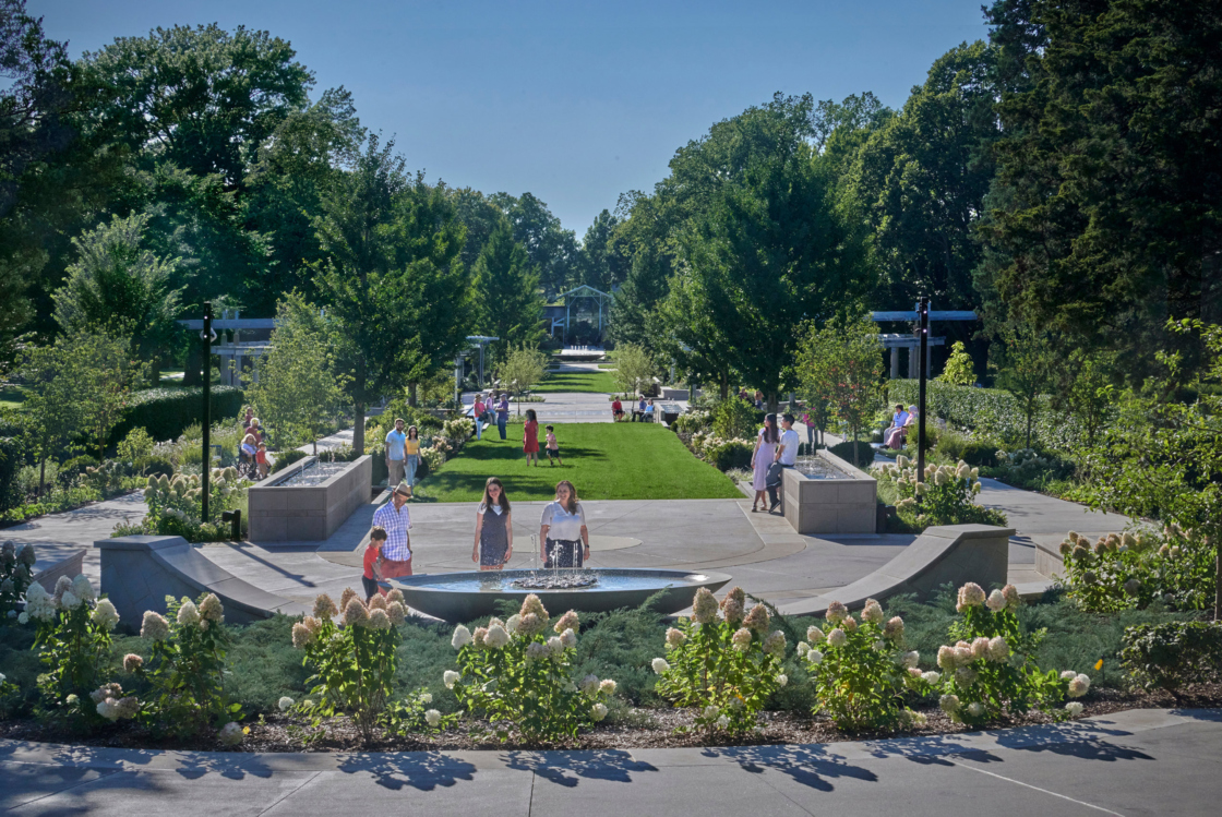 Guests enjoy fountains and benches throughout the Celebration Garden