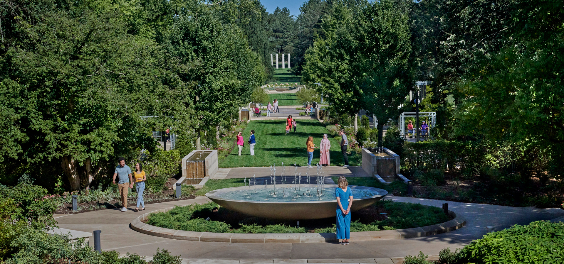 Guests walking around the new Grand Garden in Summer