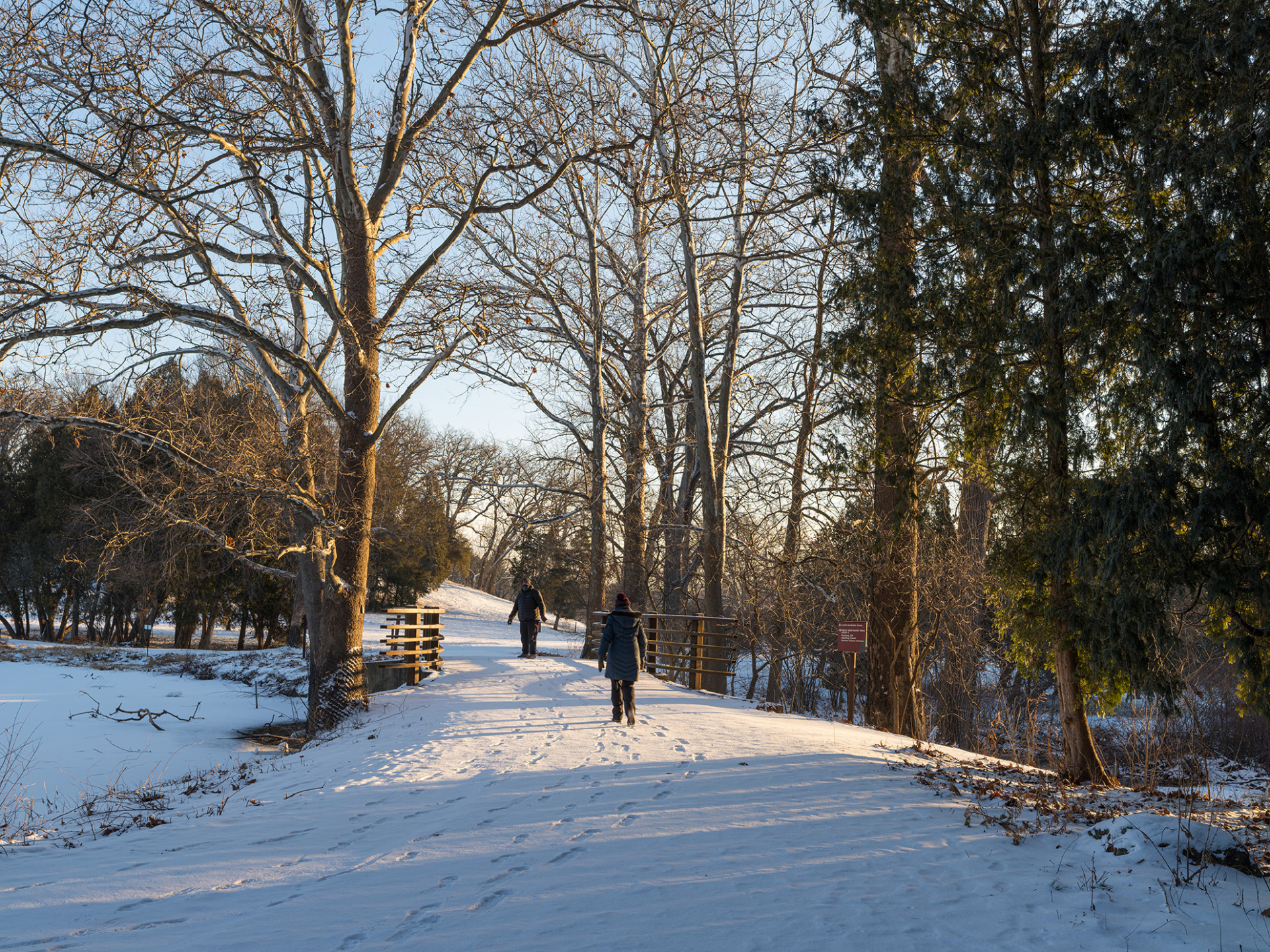 Guests hiking near Lake Marmo in winter.