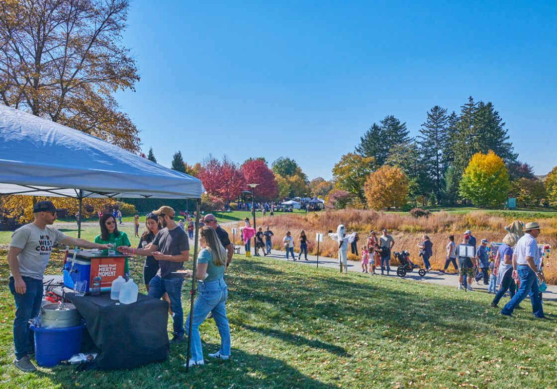 Guests enjoy samplings of beer around Meadow Lake in fall