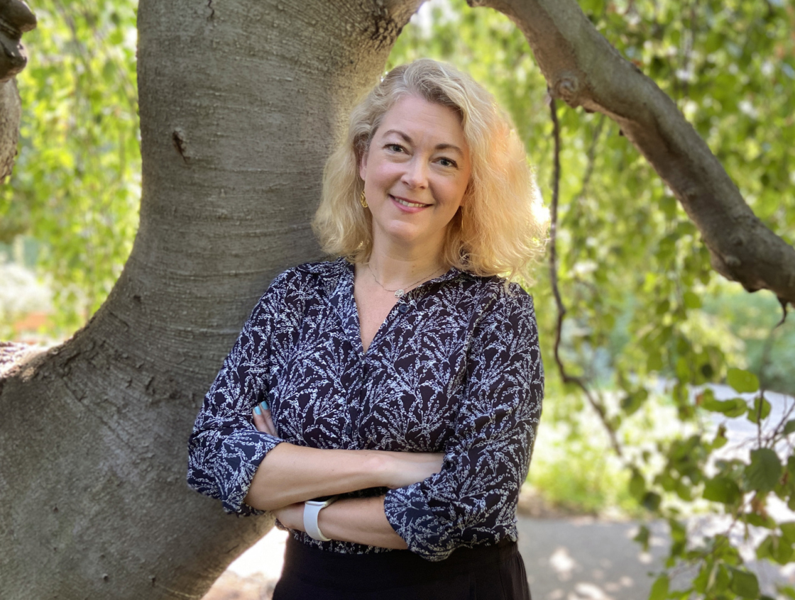 Murphy standing by a tree in the Ground Cover Garden