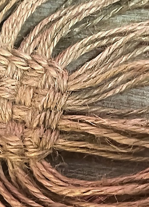 Twined salla bag weaving. Ropes woven together to form the base of a basket.