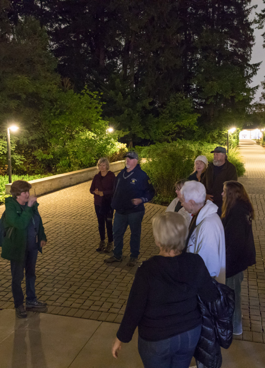 A group getting ready to take a hike at night at the Arboretum