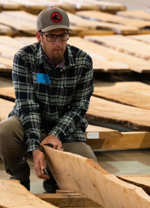 A member looks at slabs for sale at the arboretum