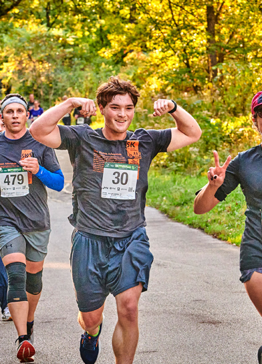 Photograph of runners participating in the Fall Color 5K Run and Walk at The Morton Arboretum