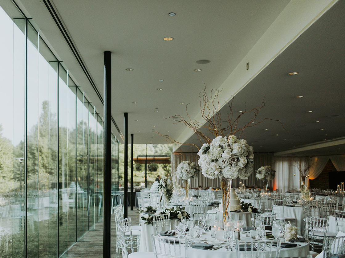 Wedding dinner tables set up in the Gingko Room