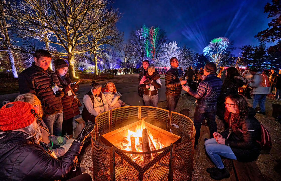 Families enjoying fire pits on the Illumination trail