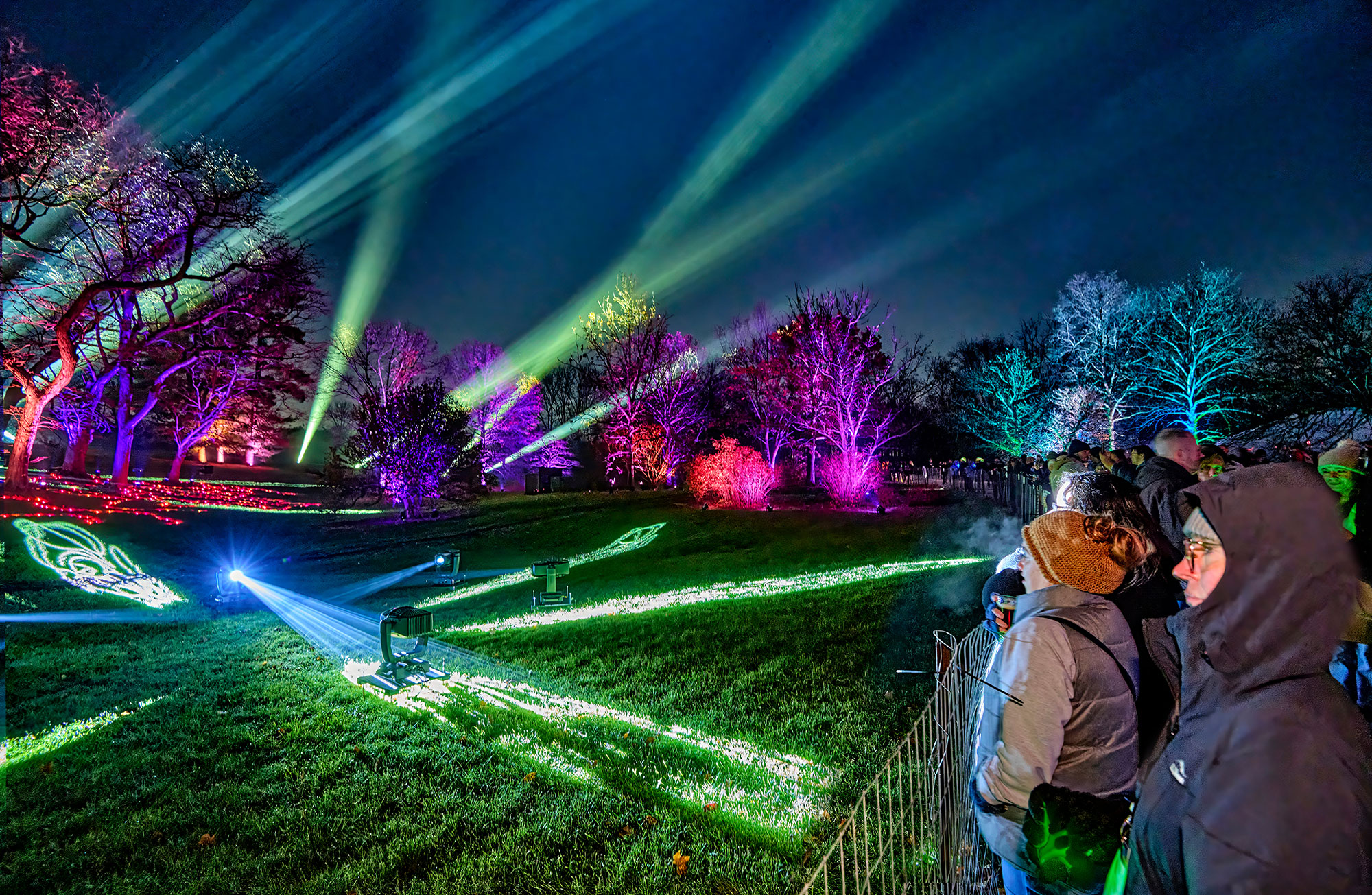 Families enjoying one of the light displays on the Illumination trail