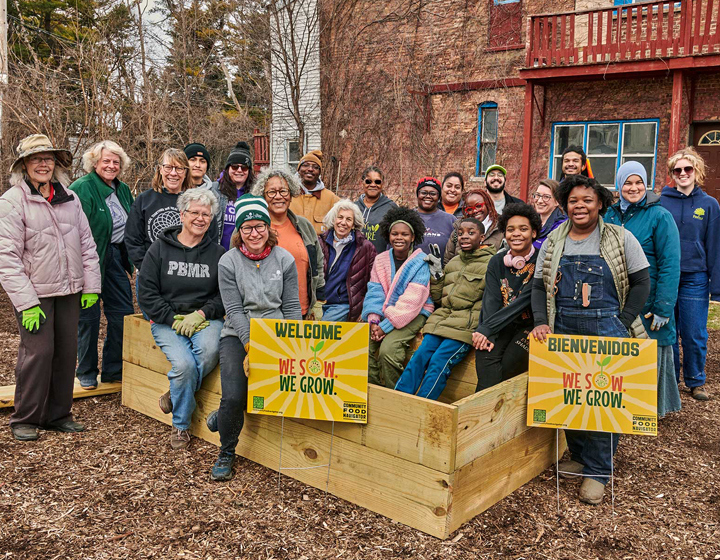 Organizers and participants pose for a photo at We Sow We Grow headquarters in West Pullman