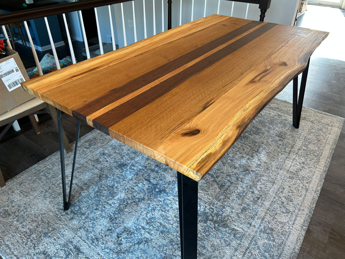 Two-tone dining table made from Arboretum wood slabs