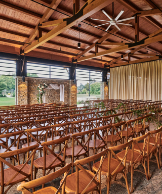 Wood chairs set up for event in the Firefly Pavilion