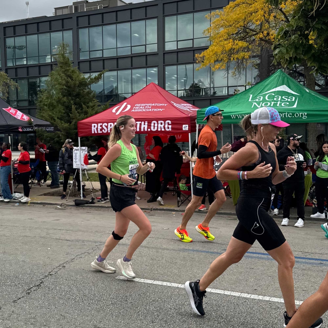 Runner in Team Morton Arboretum tank top