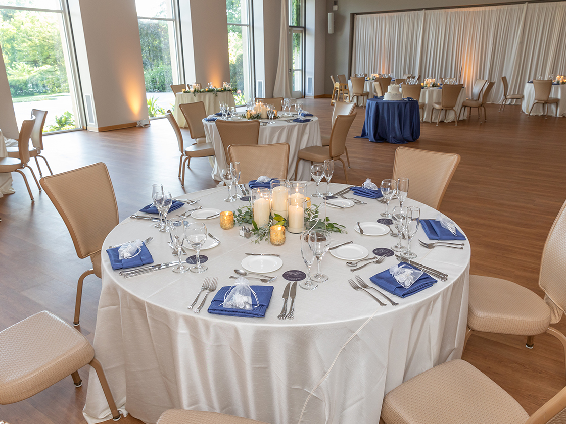 Dinner table with candles in the Arbor Room