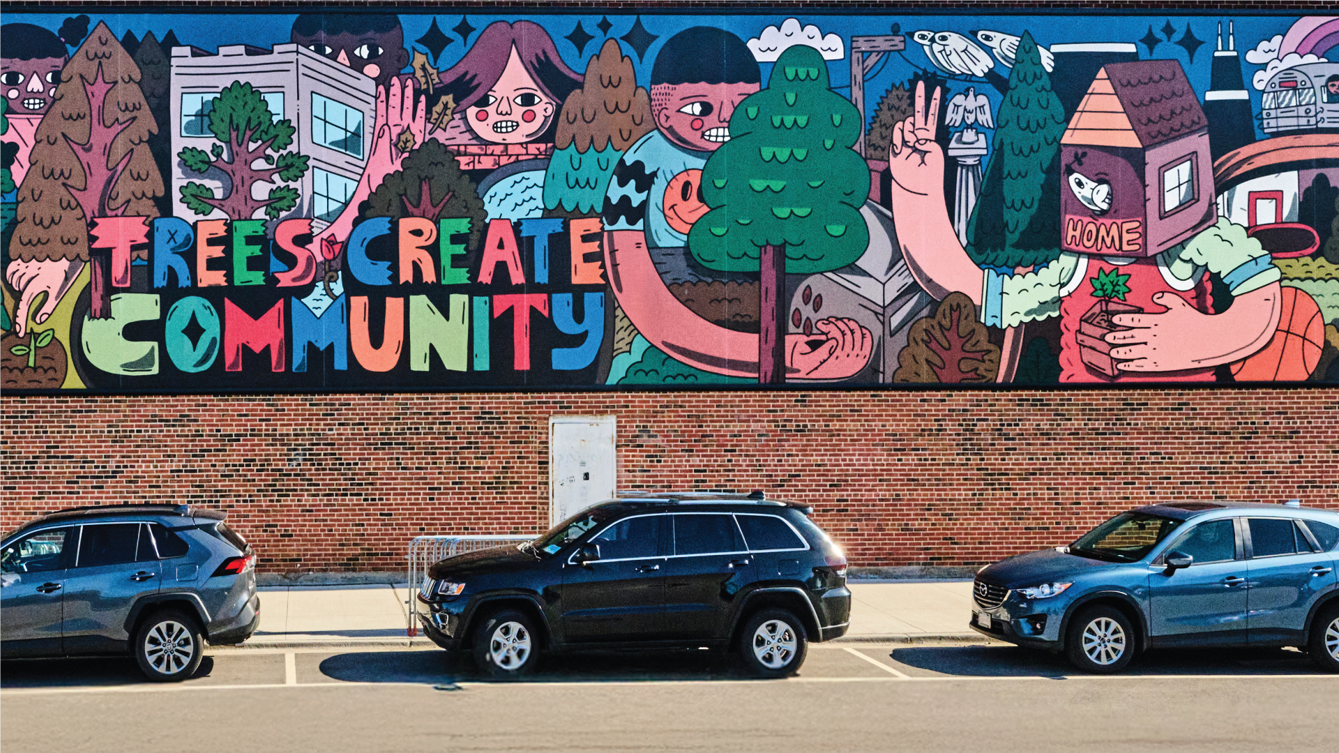 Thumbnail for video showing a mural of Trees Create Community by Sentrock