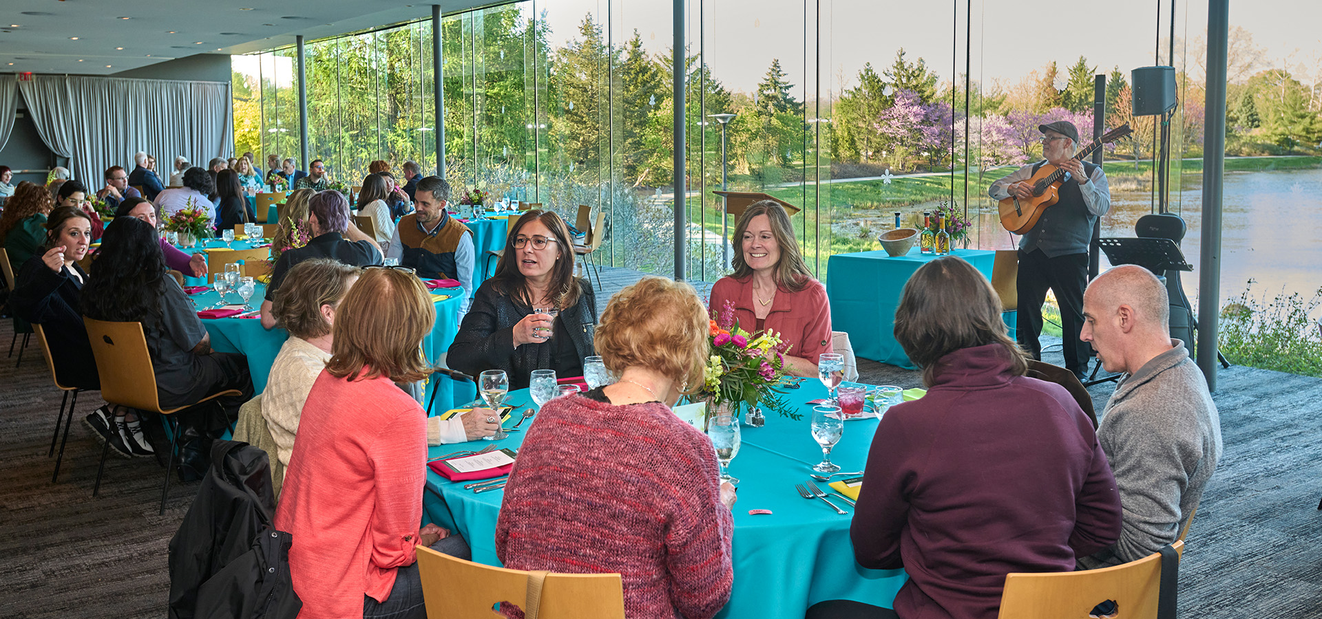 Photograph of attendees at the Tequila Dinner hosted at the Morton Arboretum