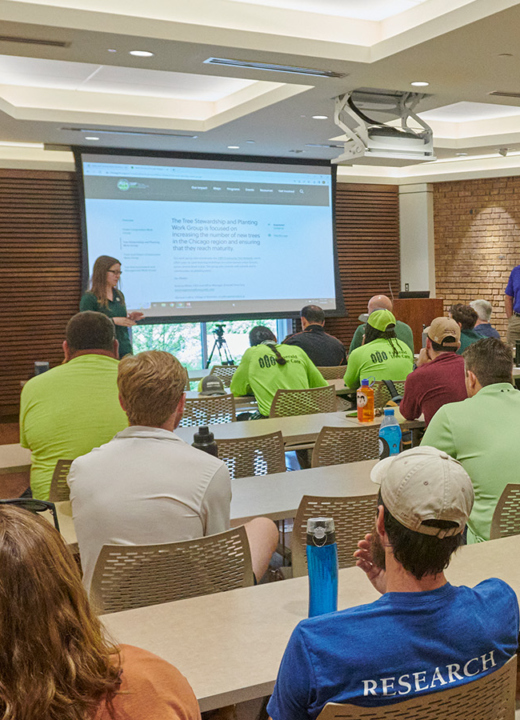A group of tree professionals sitting in Cudahy room watching a presentation hosted by CRTI.