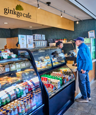 A guest orders a coffee from the Ginkgo Cafe in the Visitor Center.