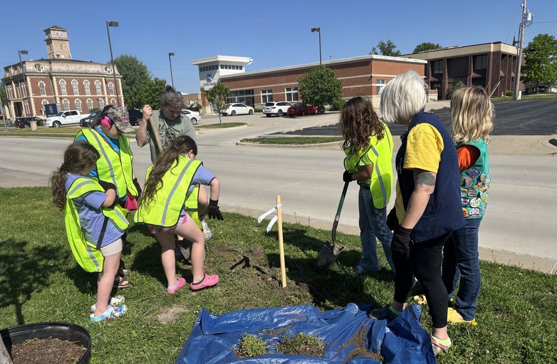 Volunteers assist with a community tree planting in Effingham Illinois